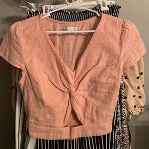 Hollister pale pink cropped tank with cut out
